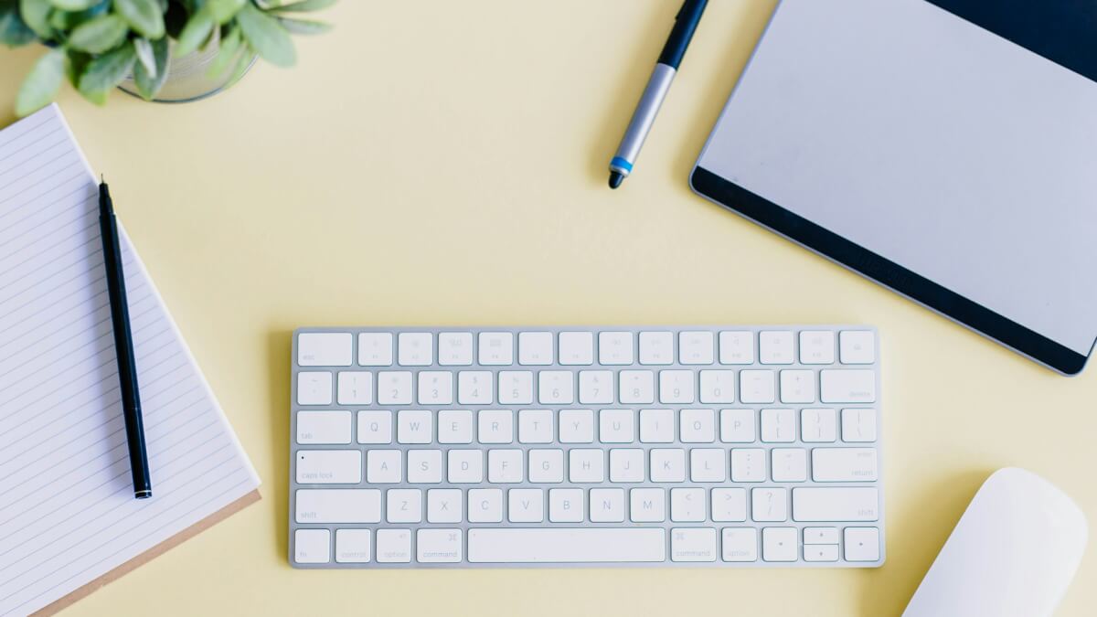 a keyboard and a mouse on a desk