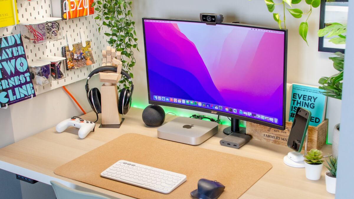 a desktop computer sitting on top of a wooden desk