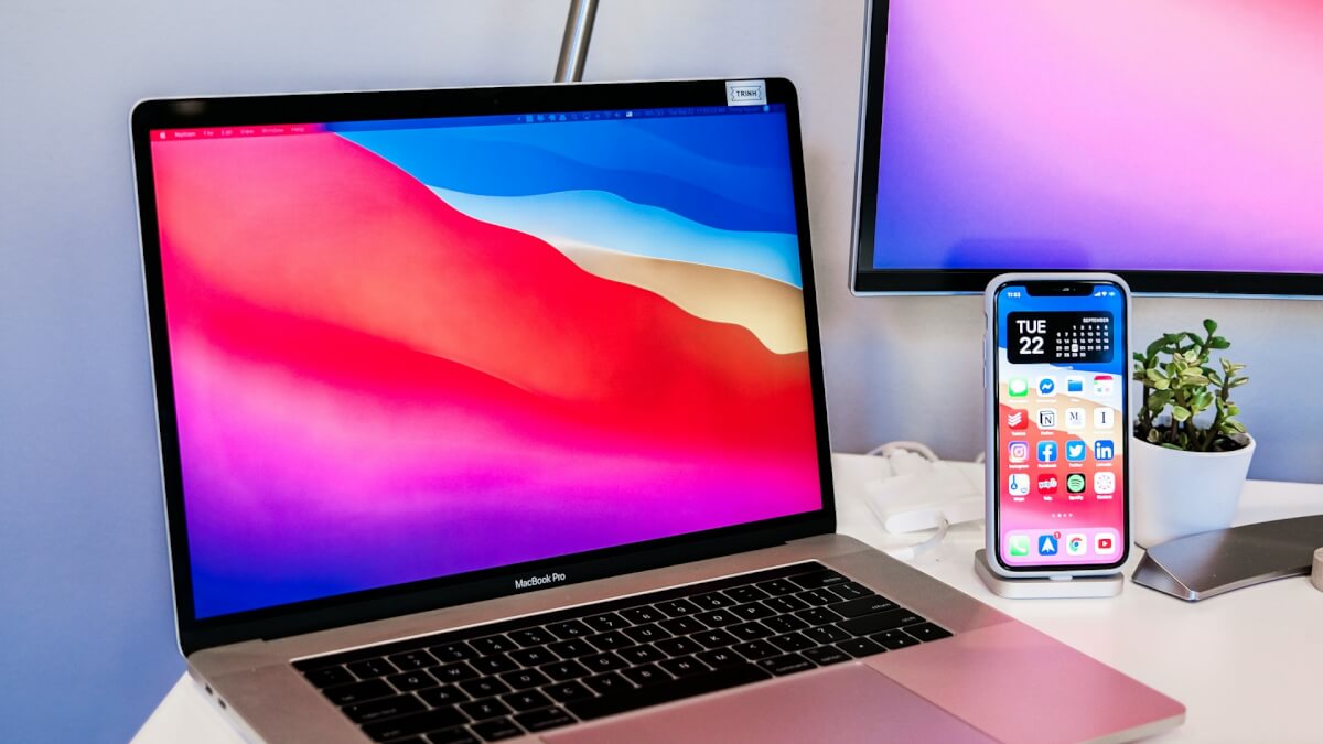 macbook pro on white table