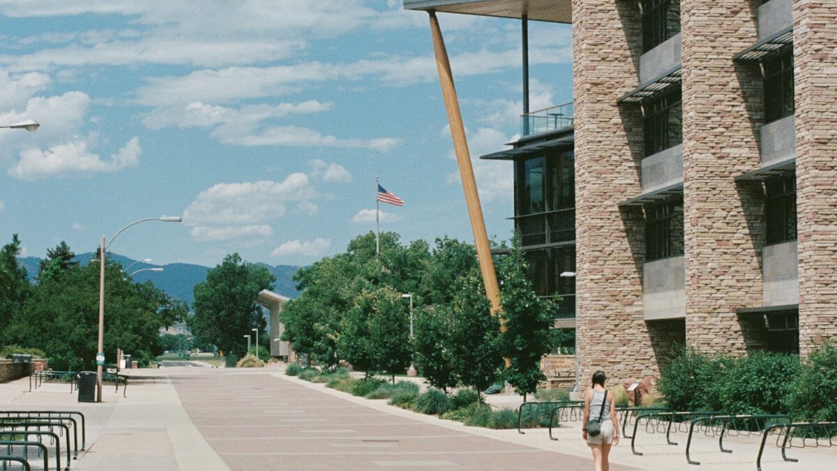 a person walking on a sidewalk