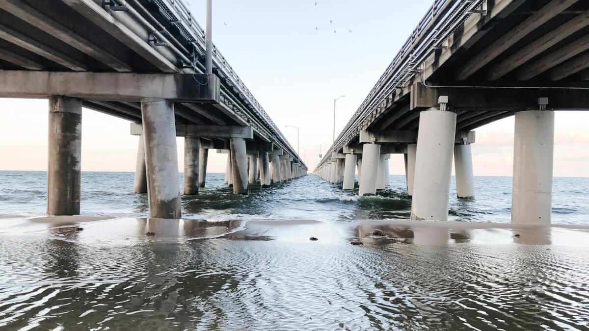 brown wooden bridge over water